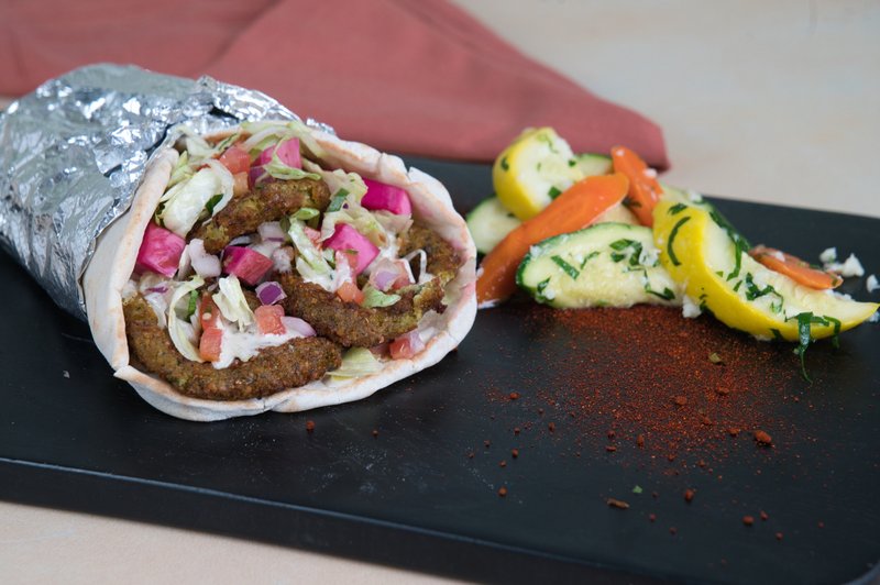 Falafel wrap with tahini and fresh vegetables at Phoenician Garden Fresno