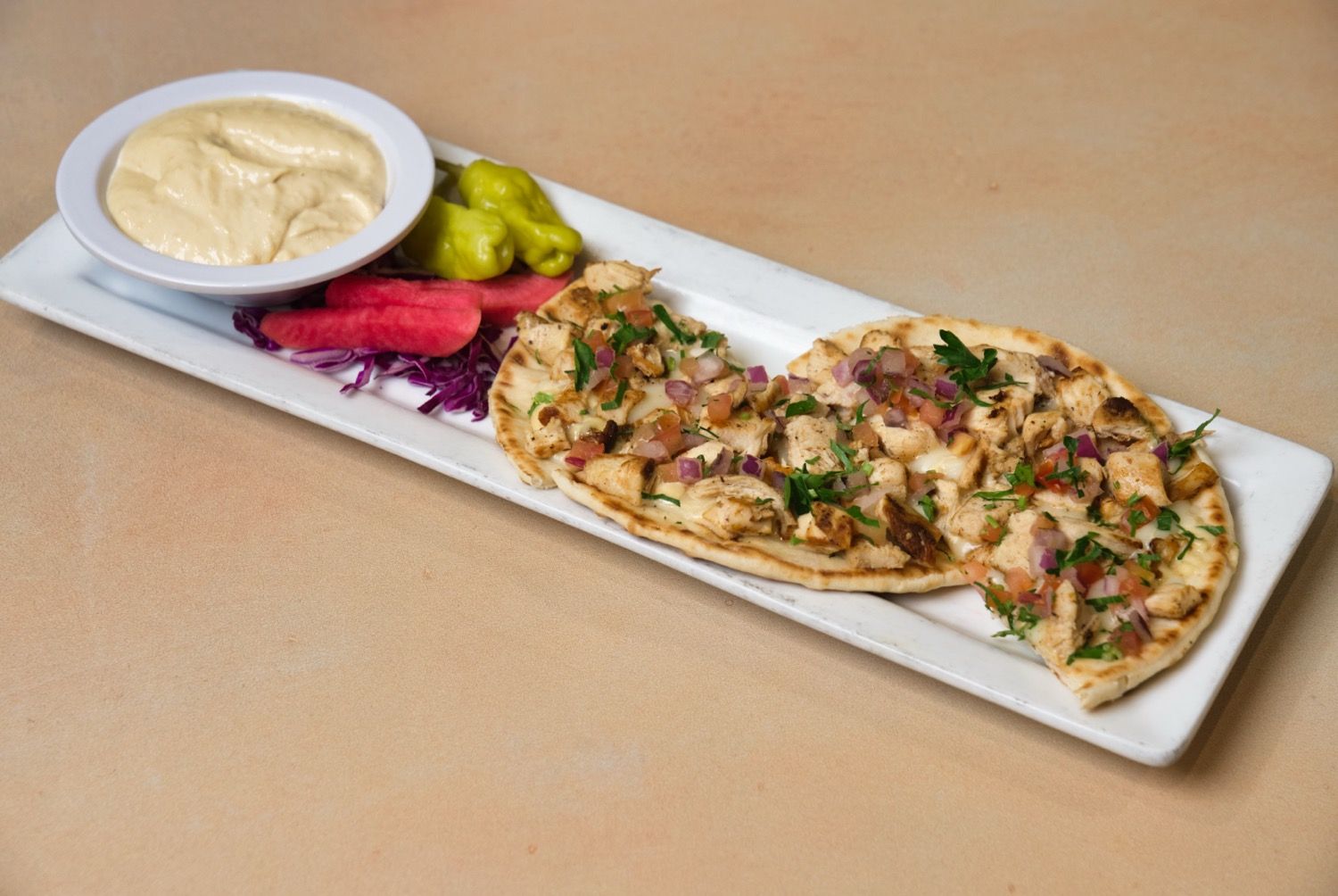 Phoenician pizza with garlic sauce and mozzarella at Phoenician Garden Fresno