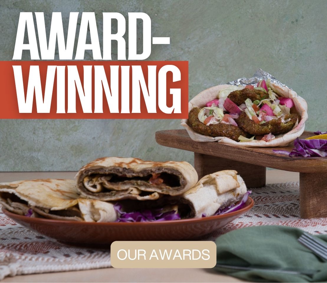 The Phoenician Garden award badges, Best of Central California Silver, Nextdoor Neighborhood Fave, DoorDash Most Loved