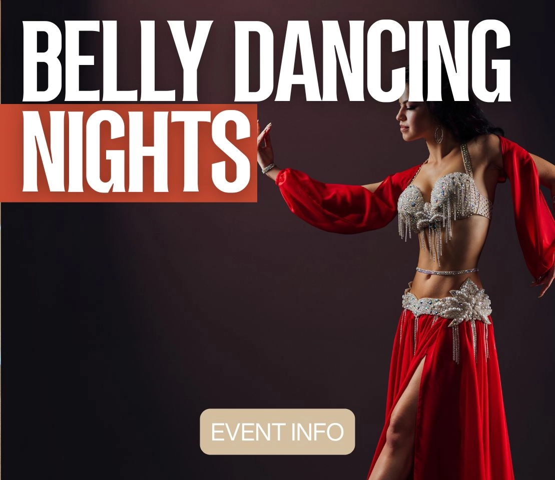 Live belly dancing night with guests dining at Phoenician Garden Mediterranean restaurant in Fresno
